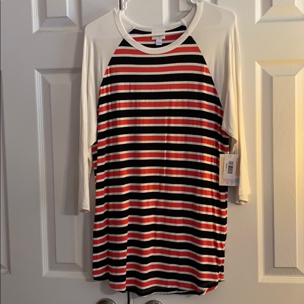 New with tags LulaRoe Randy shirt.